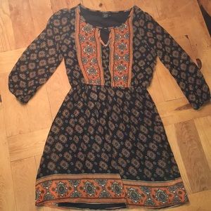 Super cute orange patterned fall dress!